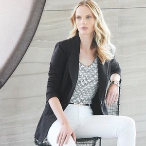 Sleek black suit jacket / blazer